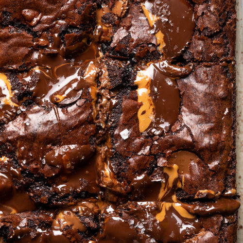 Whenever I find peanut butter cups on sale, I stockpile them so I can make my Peanut Butter Cup Brownies! They're rich, fudge, and so decadent! If you love the combination of chocolate and peanut butter, this is the brownie recipe for you!