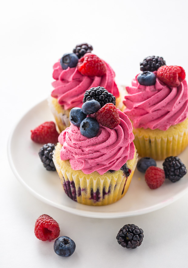 These Triple Berry Cupcakes are moist, fluffy, and bursting with fresh fruit in every bite.