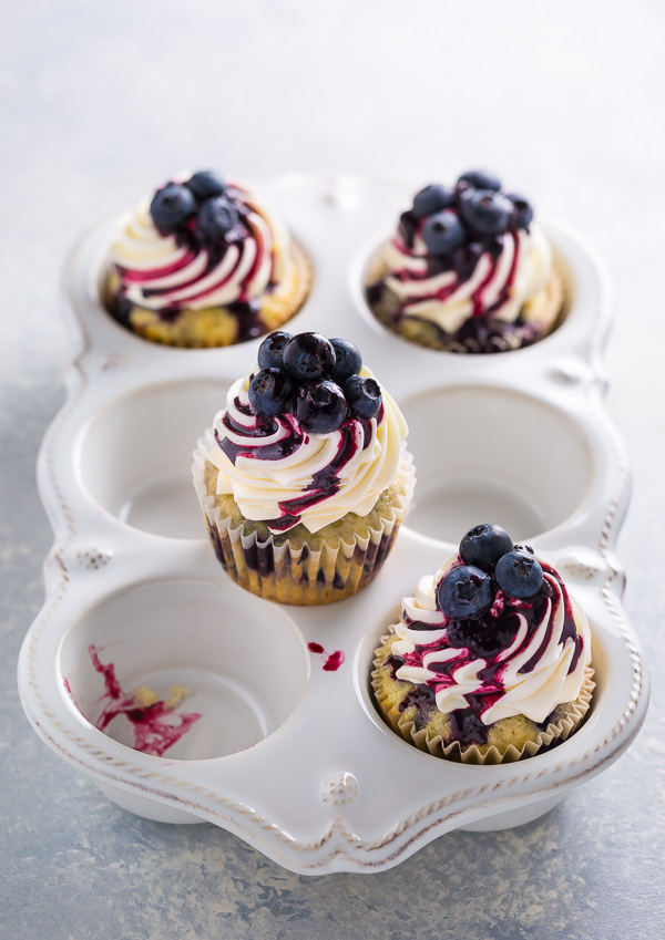 Stunning and delicious, these White Chocolate Blueberry Cupcakes are a must bake for blueberry lovers!