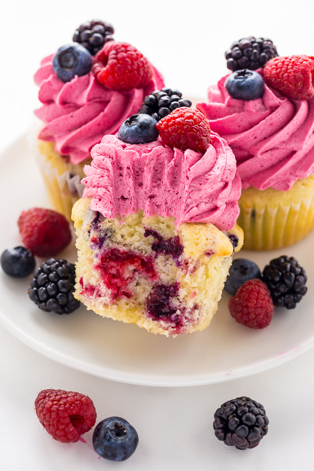 These Triple Berry Cupcakes are moist, fluffy, and bursting with fresh fruit in every bite.