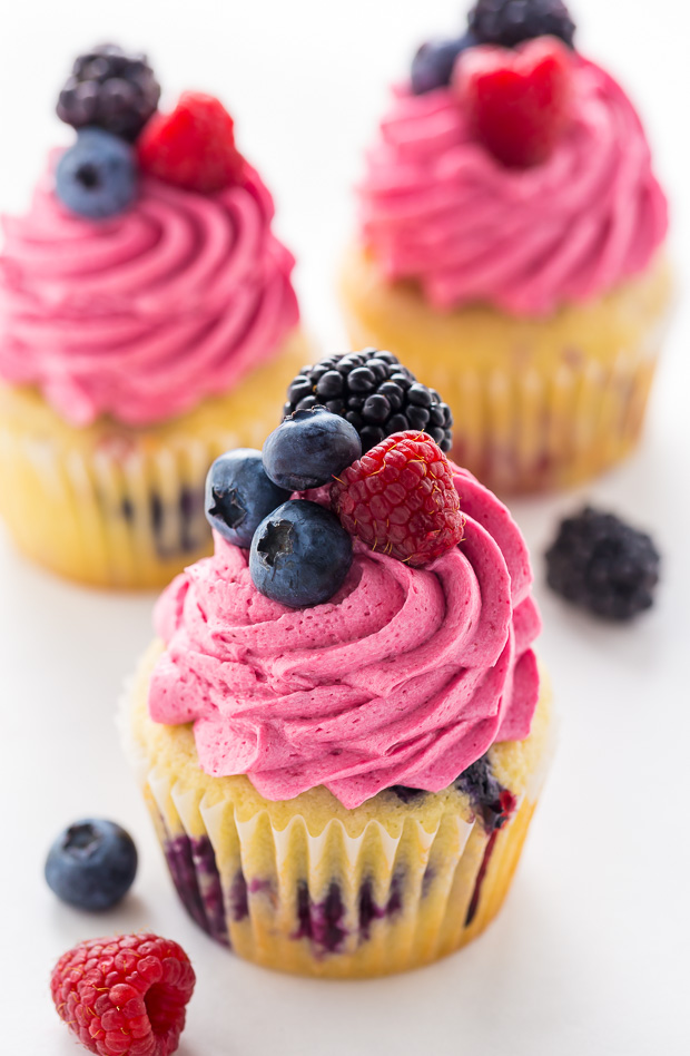 These Triple Berry Cupcakes are moist, fluffy, and bursting with fresh fruit in every bite.