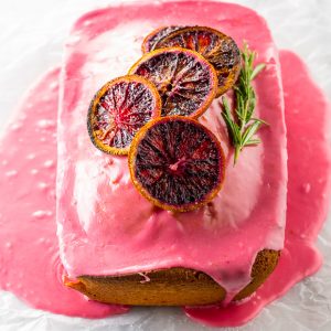 This STUNNING Blood Orange Pound Cake is moist, flavorful, and covered in a vibrant blood orange glaze.