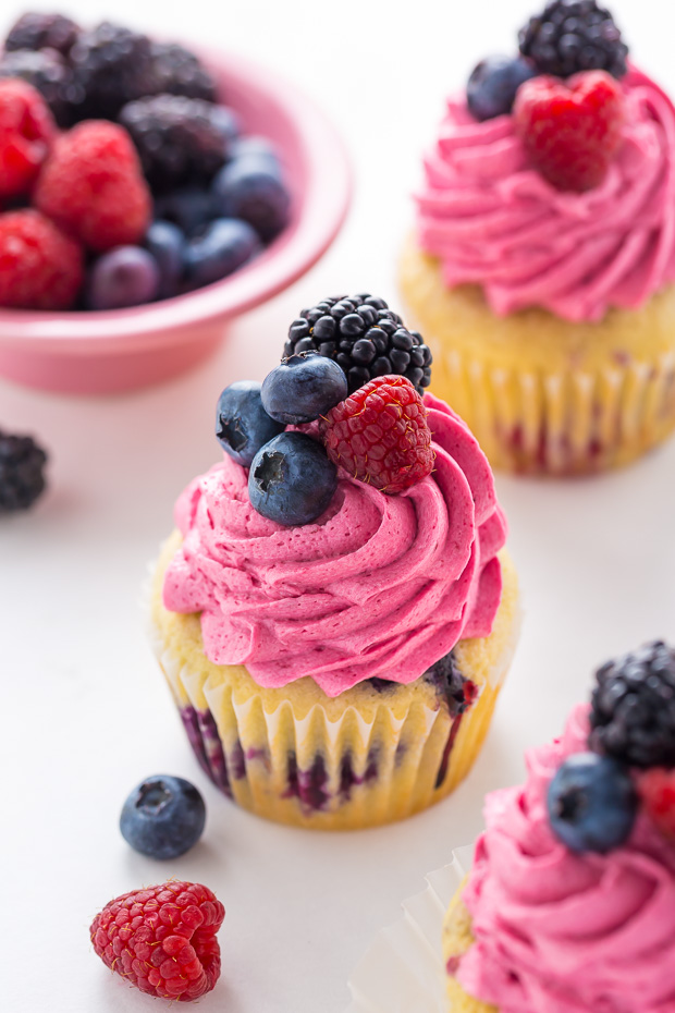 These Triple Berry Cupcakes are moist, fluffy, and bursting with fresh fruit in every bite.