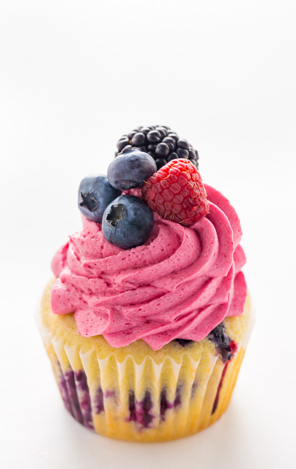 These Triple Berry Cupcakes are moist, fluffy, and bursting with fresh fruit in every bite.