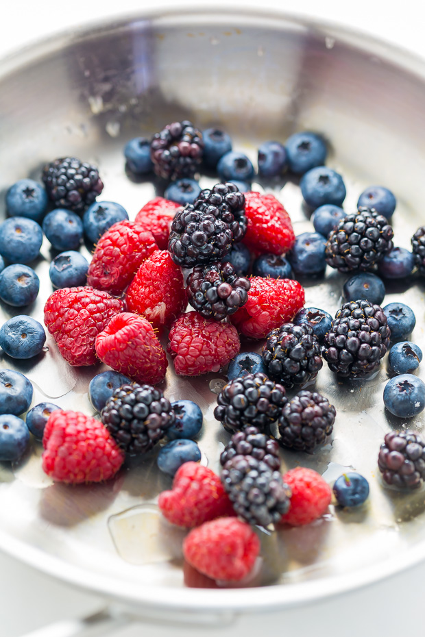 These Triple Berry Cupcakes are moist, fluffy, and bursting with fresh fruit in every bite.