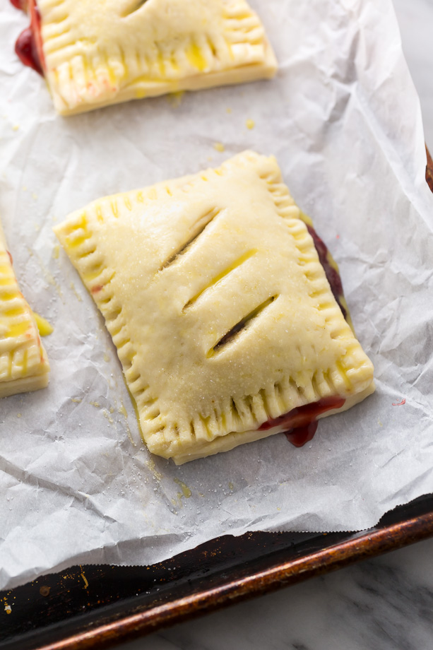 Homemade Cherry Hand Pies have flaky crust and juicy filling!