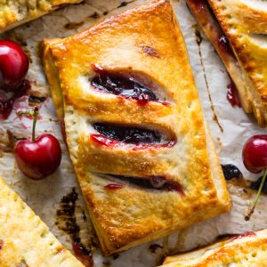 Homemade Cherry Hand Pies have flaky crust and juicy filling!