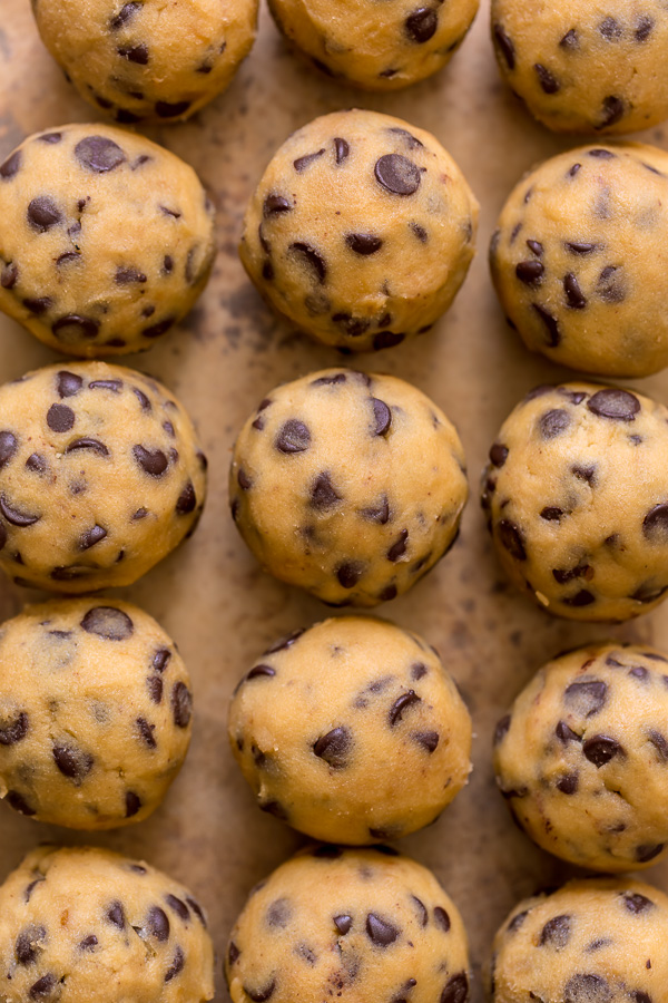 Cookie dough balls on a baking sheet. 