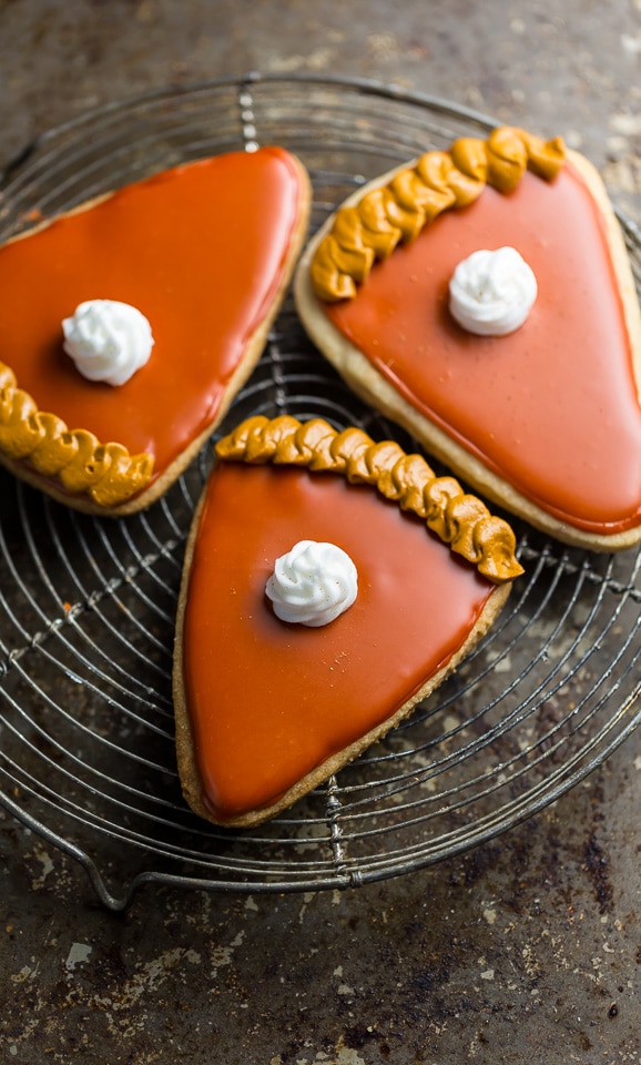 These Pumpkin Spice Cut-Out Cookies are dressed up to look like little slices of pumpkin pie! Does it get any cuter than this? 