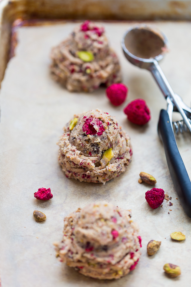 These Raspberry Pistachio Chocolate Chunk Cookies are thick, chewy, and so flavorful! Bonus: they're super pretty, too!