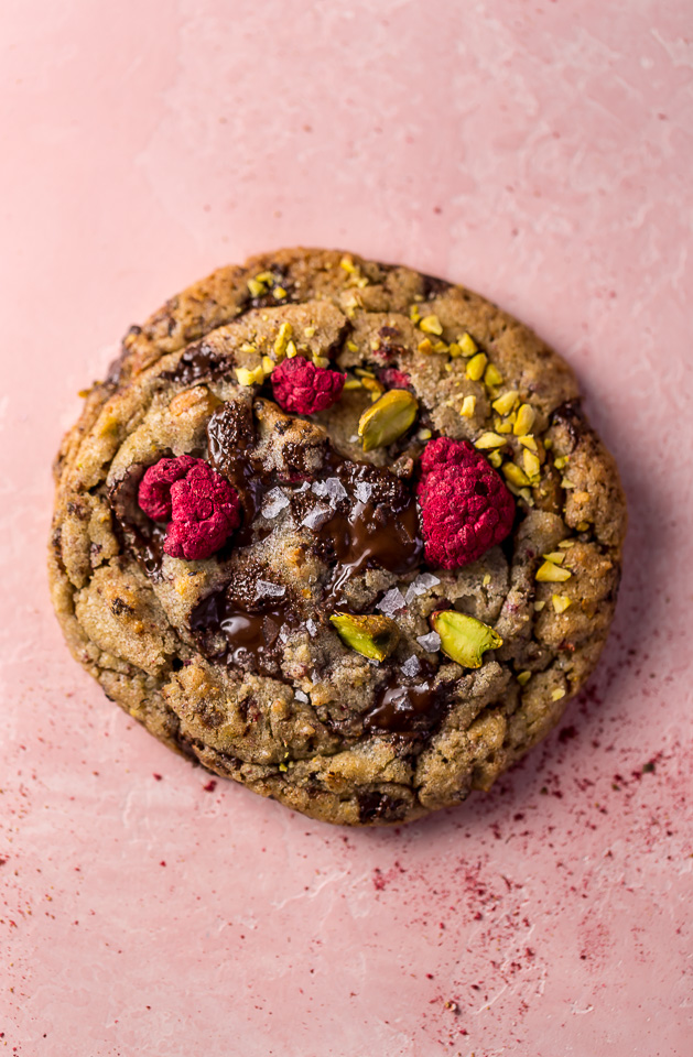 These Raspberry Pistachio Chocolate Chunk Cookies are thick, chewy, and so flavorful! Bonus: they're super pretty, too!