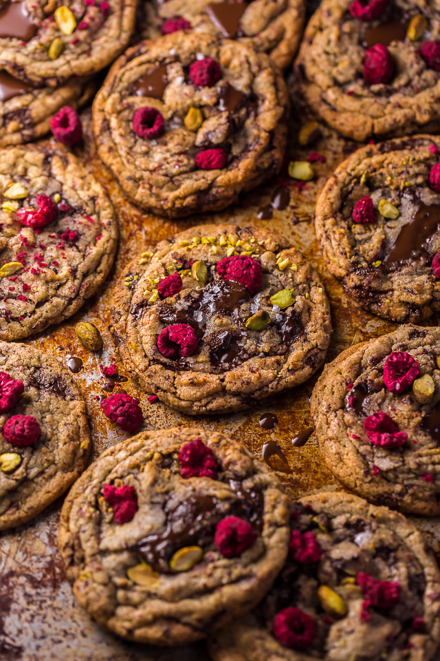 These Raspberry Pistachio Chocolate Chunk Cookies are thick, chewy, and so flavorful! Bonus: they're super pretty, too!