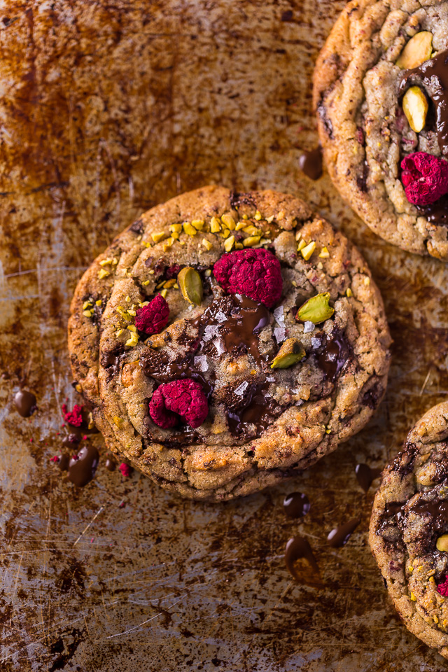 These Raspberry Pistachio Chocolate Chunk Cookies are thick, chewy, and so flavorful! Bonus: they're super pretty, too!