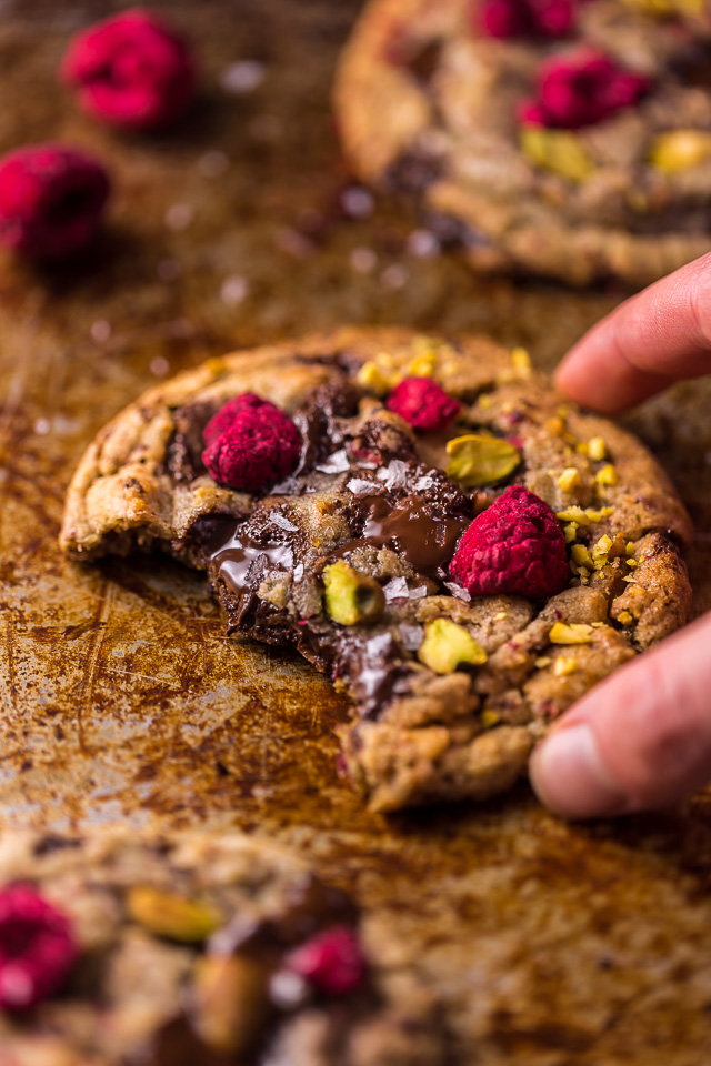 These Raspberry Pistachio Chocolate Chunk Cookies are thick, chewy, and so flavorful! Bonus: they're super pretty, too!
