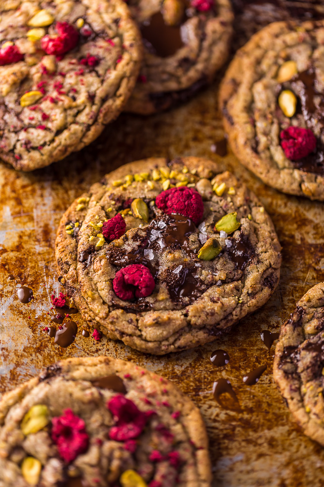 These Raspberry Pistachio Chocolate Chunk Cookies are thick, chewy, and so flavorful! Bonus: they're super pretty, too!