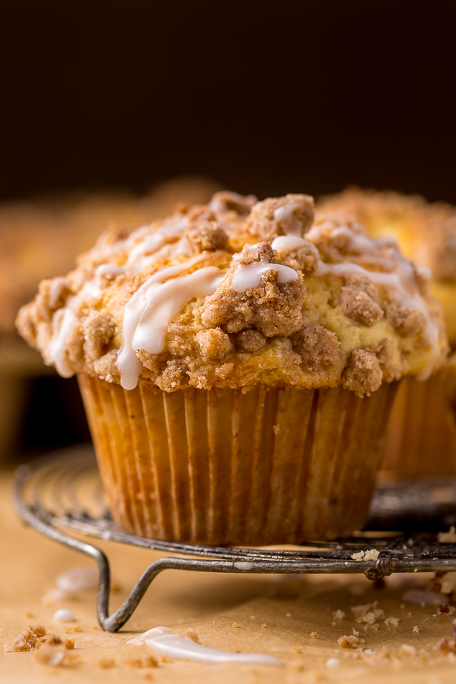 Bakery-Style Coffee Cake Muffins are moist, flavorful, and topped with plenty of buttery crumbs. This is one of those recipes you'll make over and over again!