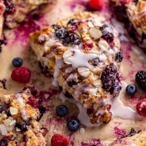 These Bakery-Style Triple Berry Buttermilk Scones are flaky yet moist and so delicious! And they're so easy to make!