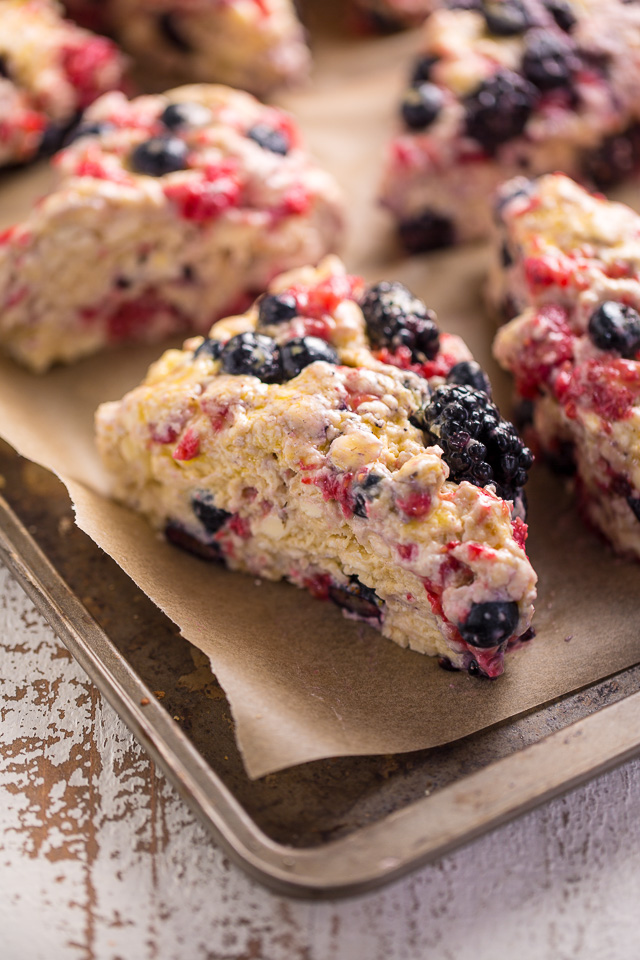These Bakery-Style Triple Berry Buttermilk Scones are flaky yet moist and so delicious! And they're so easy to make!