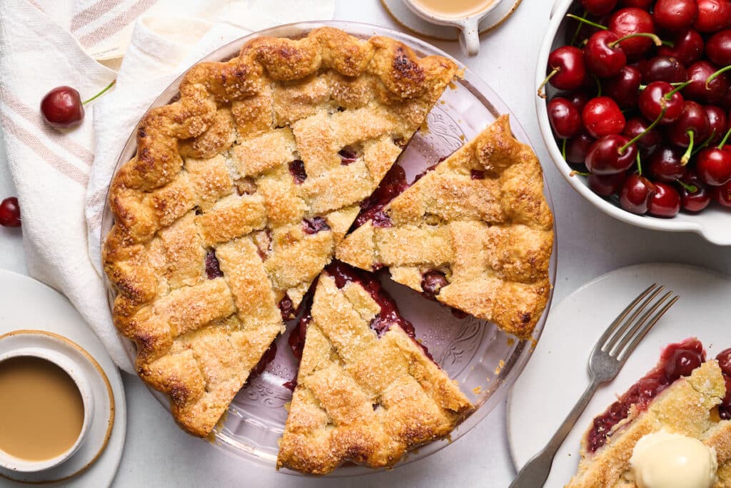 Golden brown pie crust on a cherry pie recipe.