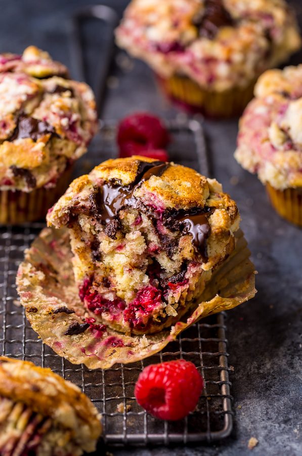 Mmm... these Dark Chocolate Chunk Raspberry Crumb Muffins are so easy and delicious! Perfect for breakfast or brunch.