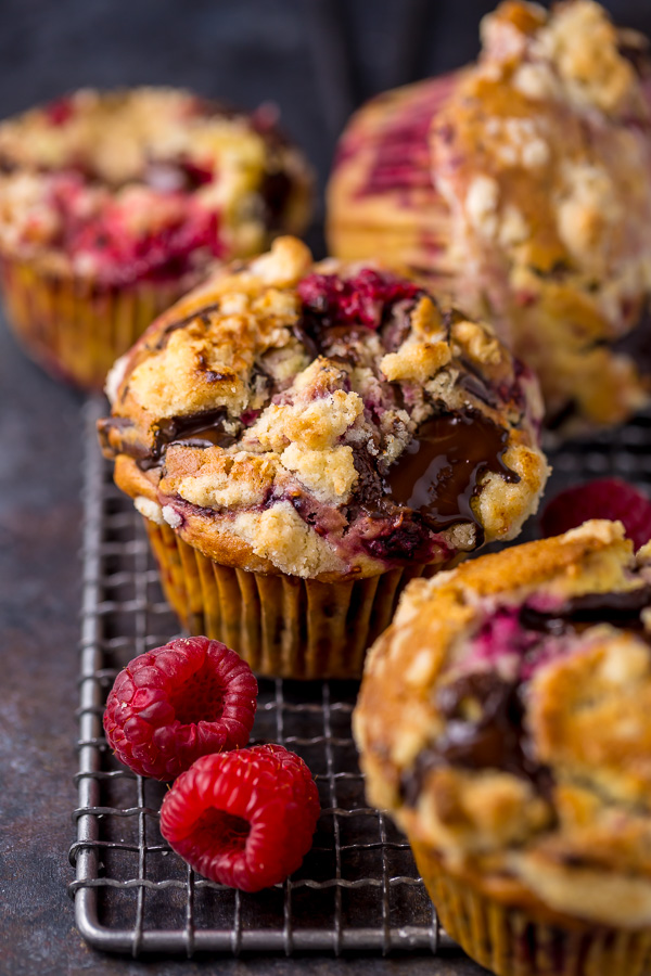 Mmm... these Dark Chocolate Chunk Raspberry Crumb Muffins are so easy and delicious! Perfect for breakfast or brunch.