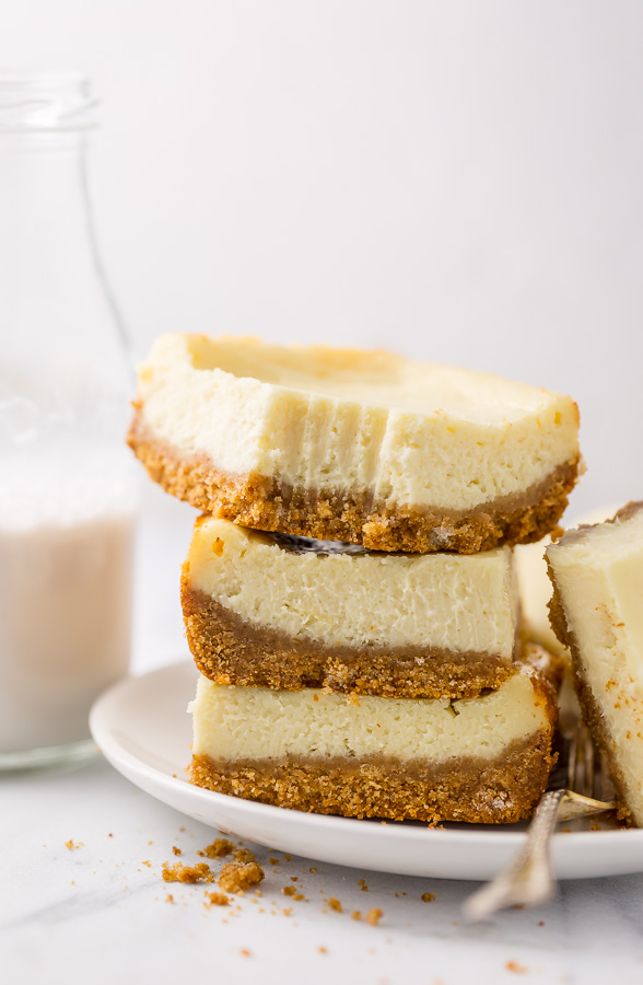 These New York-Style Cheesecake Bars are thick, creamy, and so easy! Perfect for almost any occasion!