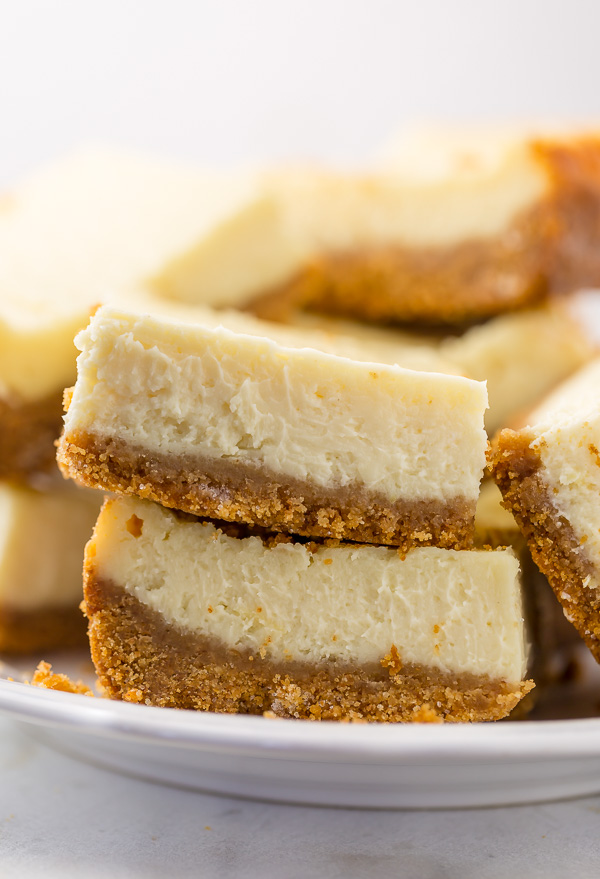 These New York-Style Cheesecake Bars are thick, creamy, and so easy! Perfect for almost any occasion!