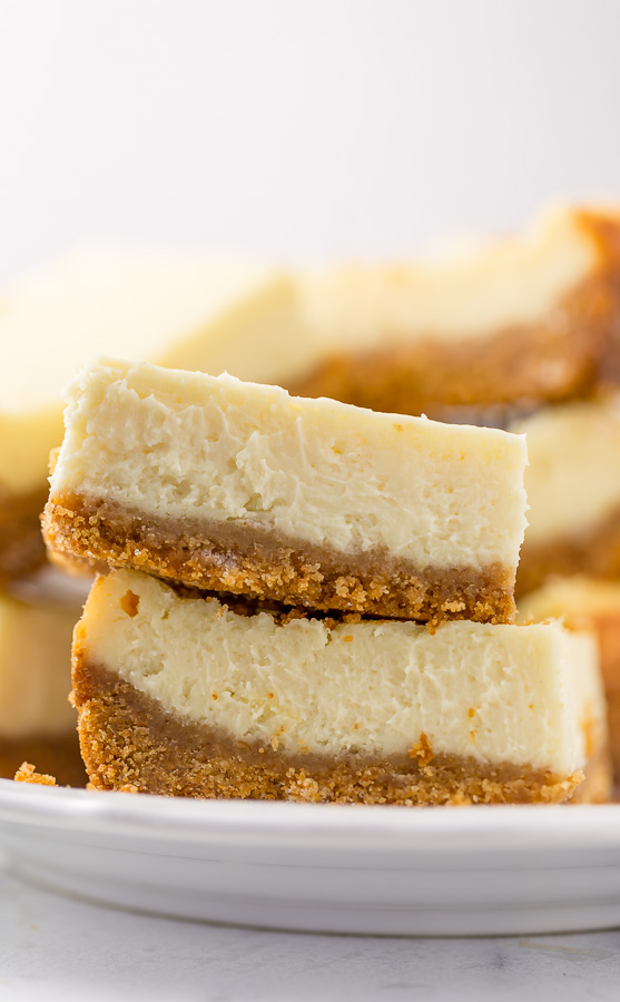 These New York-Style Cheesecake Bars are thick, creamy, and so easy! Perfect for almost any occasion!