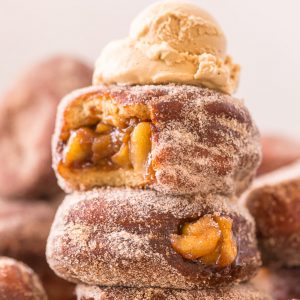 Fluffy Apple Pie Doughnuts are the ULTIMATE Fall treat! And so darn good with a cup of coffee.