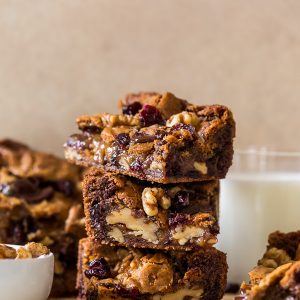 Chocolate Cranberry Walnut Blondies are crunchy, chewy, gooey and so delicious! A super easy blondie recipe that's made in one bowl and so perfect for the holiday celebrations.