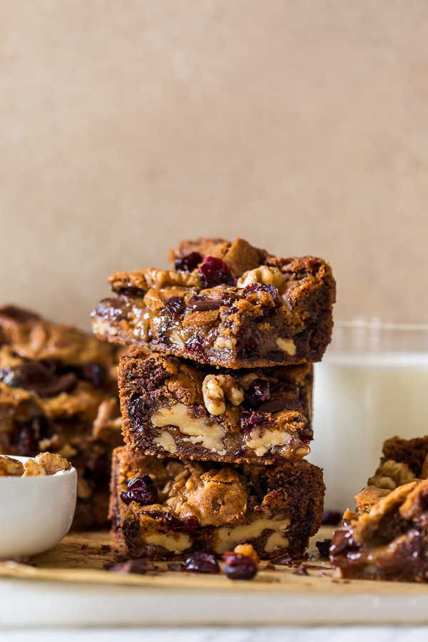 Chocolate Cranberry Walnut Blondies are crunchy, chewy, gooey and so delicious! A super easy blondie recipe that's made in one bowl and so perfect for the holiday celebrations.