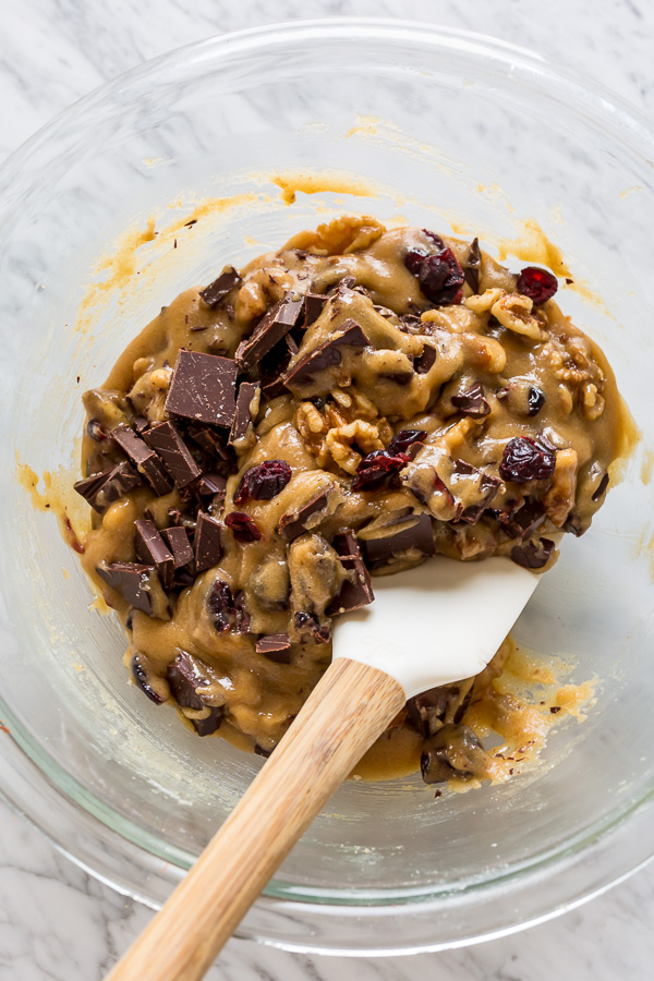 Chocolate Cranberry Walnut Blondies are crunchy, chewy, gooey and so delicious! A super easy blondie recipe that's made in one bowl and so perfect for the holiday celebrations.