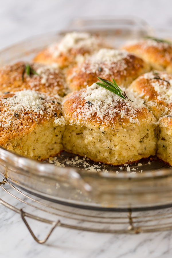 Rosemary Parmesan Biscuits are fluffy, flavorful, and so good with a bowl of soup or chili! Perfect for Thanksgiving, too!