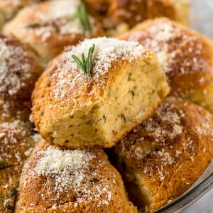 Rosemary Parmesan Biscuits are fluffy, flavorful, and so good with a bowl of soup or chili! Perfect for Thanksgiving, too!