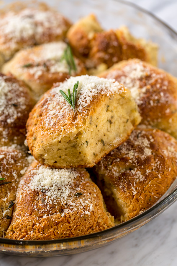 Rosemary Parmesan Biscuits are fluffy, flavorful, and so good with a bowl of soup or chili! Perfect for Thanksgiving, too!