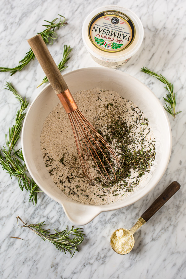 Rosemary Parmesan Biscuits are fluffy, flavorful, and so good with a bowl of soup or chili! Perfect for Thanksgiving, too!