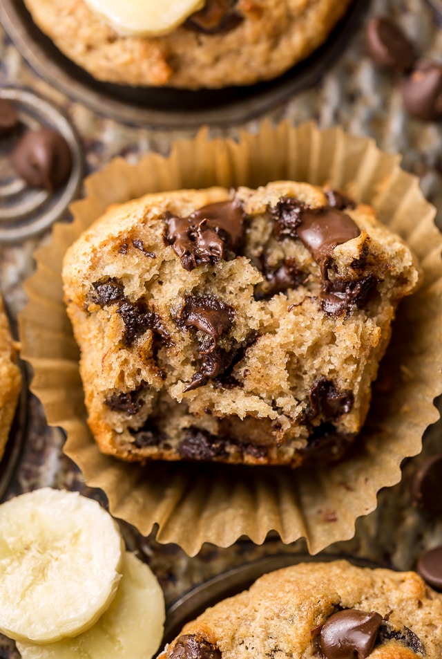 Healthy Banana Muffins are moist, fluffy, and so sweet! A handful of chocolate chips makes them a little indulgent, without going overboard. Made with honey, whole wheat flour, and protein packed Greek yogurt, these are perfect for breakfast or as an afternoon snack. This is a great recipe you'll want to use over and over again!