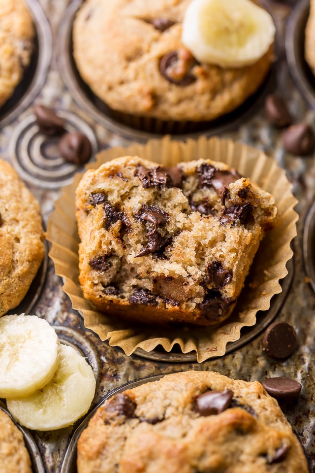 Healthy Banana Muffins are moist, fluffy, and so sweet! A handful of chocolate chips makes them a little indulgent, without going overboard. Made with honey, whole wheat flour, and protein packed Greek yogurt, these are perfect for breakfast or as an afternoon snack. This is a great recipe you'll want to use over and over again!