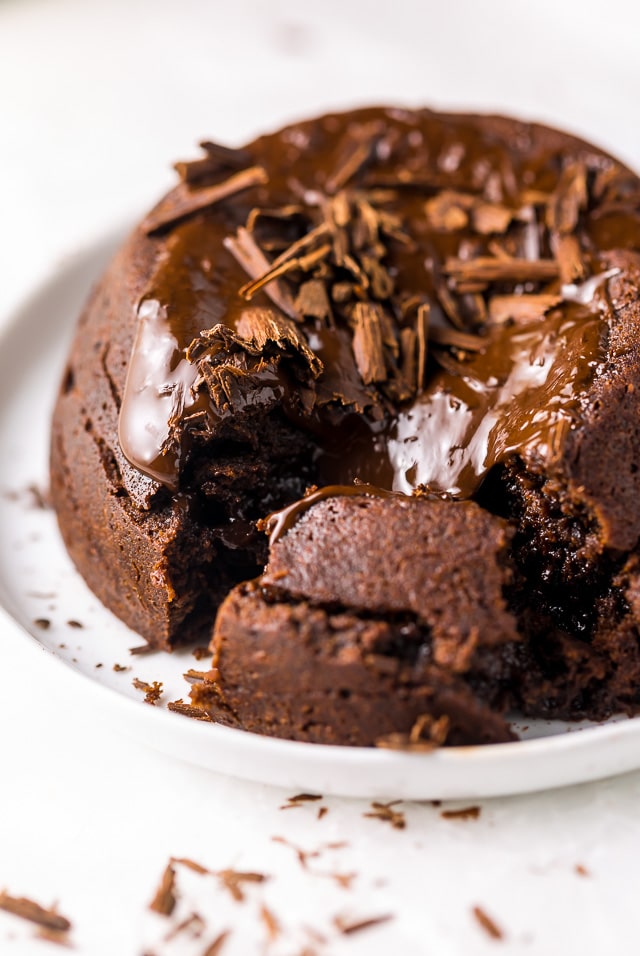 These Easy Molten Chocolate Lava Cakes for Two are so delicious and perfect for Valentine's Day! A rich, decadent, and romantic chocolate dessert recipe anyone can make at home!