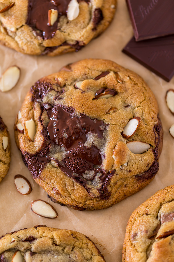 Thick and chewy Almond Amaretto Chocolate Chunk Cookies! These are so flavorful and one of the BEST cookie recipes we've ever made. If you love almonds and chocolate, you have to try them!