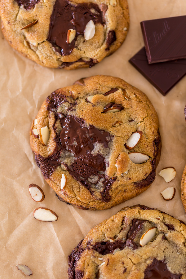 Thick and chewy Almond Amaretto Chocolate Chunk Cookies! These are so flavorful and one of the BEST cookie recipes we've ever made. If you love almonds and chocolate, you have to try them!