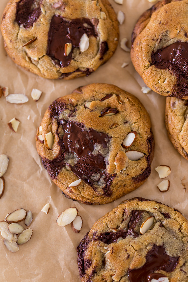 Thick and chewy Almond Amaretto Chocolate Chunk Cookies! These are so flavorful and one of the BEST cookie recipes we've ever made. If you love almonds and chocolate, you have to try them!