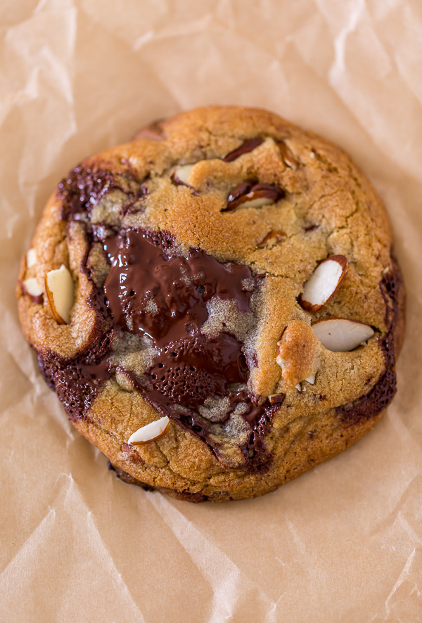 Thick and chewy Almond Amaretto Chocolate Chunk Cookies! These are so flavorful and one of the BEST cookie recipes we've ever made. If you love almonds and chocolate, you have to try them!