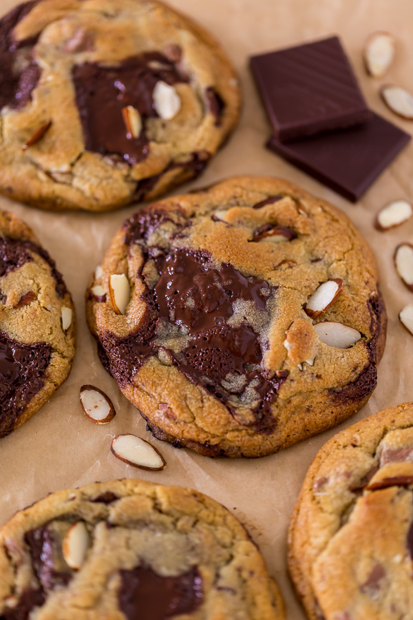 Thick and chewy Almond Amaretto Chocolate Chunk Cookies! These are so flavorful and one of the BEST cookie recipes we've ever made. If you love almonds and chocolate, you have to try them!