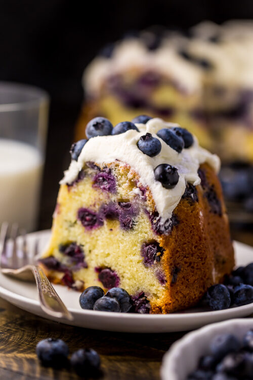 An easy and delicious recipe for The BEST Blueberry Bundt Cake! This cake is so moist, buttery, and bursting with juicy blueberries! It's perfect for brunch and pairs well with coffee or tea.