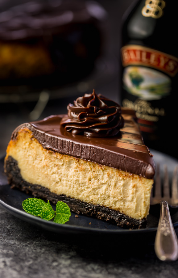 Love Baileys Irish Cream Liqueur? Crazy for cheesecake? Well then you have to try this Baileys Irish Cream Cheesecake! Featuring a chocolate cookie crust, creamy Baileys Irish Cream Cheesecake filling, and a thick layer of chocolate ganache. It's out of this world flavorful! And it's the perfect St. Patrick's Day dessert!