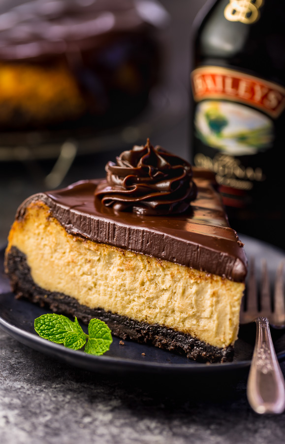 Love Baileys Irish Cream Liqueur? Crazy for cheesecake? Well then you have to try this Baileys Irish Cream Cheesecake! Featuring a chocolate cookie crust, creamy Baileys Irish Cream Cheesecake filling, and a thick layer of chocolate ganache. It's out of this world flavorful! And it's the perfect St. Patrick's Day dessert!