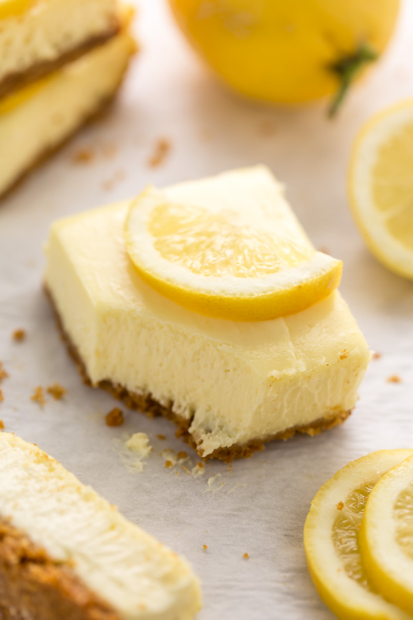 Easy Lemon Cheesecake Bars are perfect for almost any occasion! Made with fresh lemon juice, lemon zest, cream cheese, and sour cream, they're tangy, sweet, and so delicious. A must try for lemon lovers!