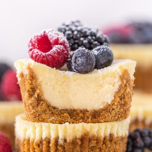 Mini Ricotta Cheesecakes are rich, creamy, and baked in a muffin tin! No water bath required for this mini cheesecake recipe. These little cuties are so perfect for parties and are always a crowd pleaser!