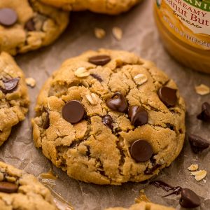 These Peanut Butter Oatmeal Chocolate Chip Cookies are so thick and chewy! Loaded with creamy peanut butter flavor, old-fashioned oats, and chocolate chips, these are a must try for peanut butter lovers! You don't have to chill the cookie dough, which makes this recipe quick and easy to bake.